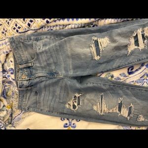 Medium-light wash jeggings with ripped dark denim